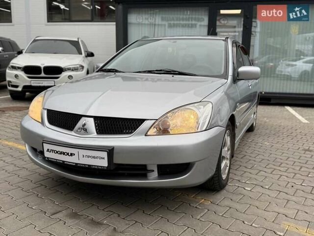 Сірий Міцубісі Lancer, об'ємом двигуна 1.6 л та пробігом 206 тис. км за 4799 $, фото 2 на Automoto.ua