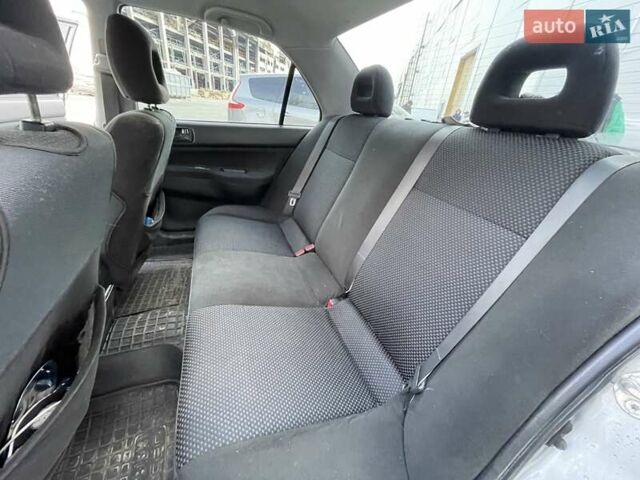 Сірий Міцубісі Lancer, об'ємом двигуна 1.6 л та пробігом 260 тис. км за 4200 $, фото 9 на Automoto.ua