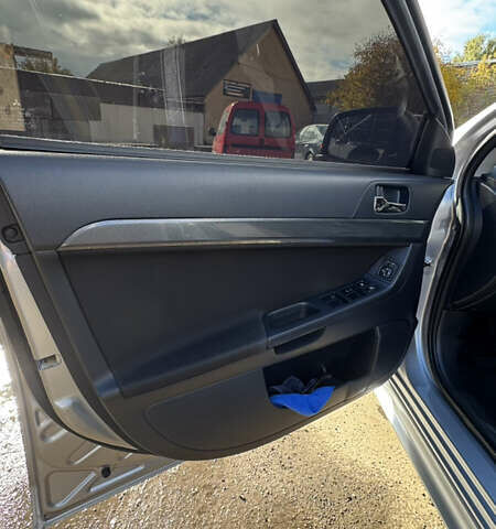 Серый Мицубиси Лансер, объемом двигателя 2 л и пробегом 190 тыс. км за 6900 $, фото 10 на Automoto.ua