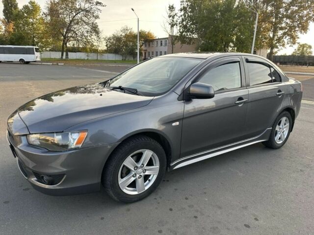 Сірий Міцубісі Lancer, об'ємом двигуна 2 л та пробігом 219 тис. км за 6700 $, фото 1 на Automoto.ua