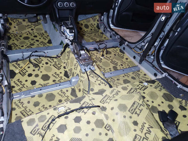 Серый Мицубиси Лансер, объемом двигателя 2 л и пробегом 175 тыс. км за 7300 $, фото 10 на Automoto.ua