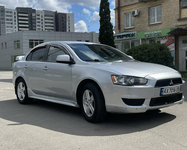Серый Мицубиси Лансер, объемом двигателя 2 л и пробегом 265 тыс. км за 5500 $, фото 2 на Automoto.ua