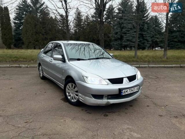 Сірий Міцубісі Lancer, об'ємом двигуна 1.6 л та пробігом 254 тис. км за 3800 $, фото 2 на Automoto.ua