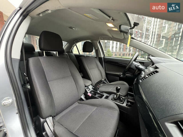 Сірий Міцубісі Lancer, об'ємом двигуна 1.5 л та пробігом 173 тис. км за 4800 $, фото 20 на Automoto.ua