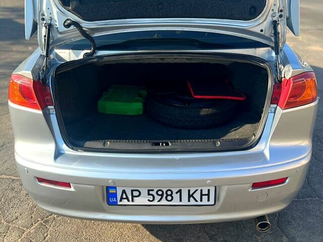 Серый Мицубиси Лансер, объемом двигателя 2 л и пробегом 151 тыс. км за 6099 $, фото 6 на Automoto.ua