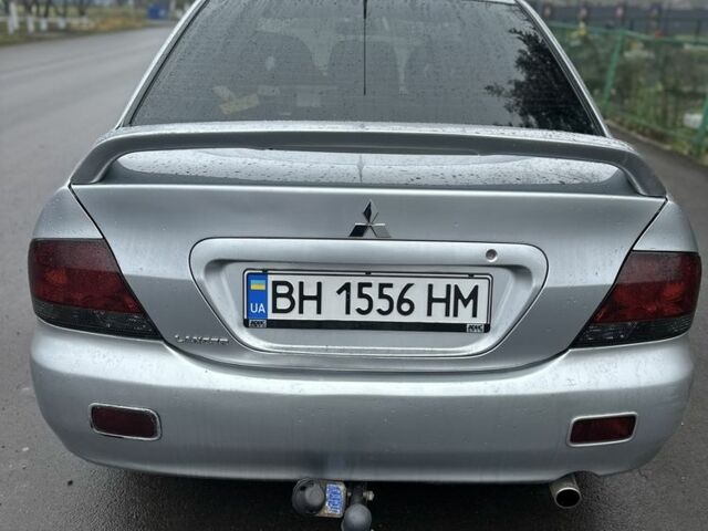 Сірий Міцубісі Lancer, об'ємом двигуна 1.6 л та пробігом 222 тис. км за 4300 $, фото 3 на Automoto.ua