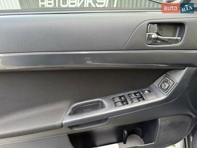 Серый Мицубиси Лансер, объемом двигателя 2 л и пробегом 230 тыс. км за 6900 $, фото 42 на Automoto.ua