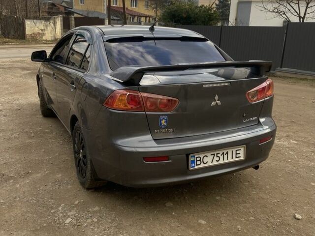 Сірий Міцубісі Lancer, об'ємом двигуна 2 л та пробігом 220 тис. км за 5750 $, фото 5 на Automoto.ua