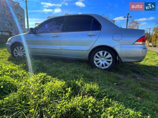 Сірий Міцубісі Lancer, об'ємом двигуна 1.6 л та пробігом 364 тис. км за 4300 $, фото 6 на Automoto.ua