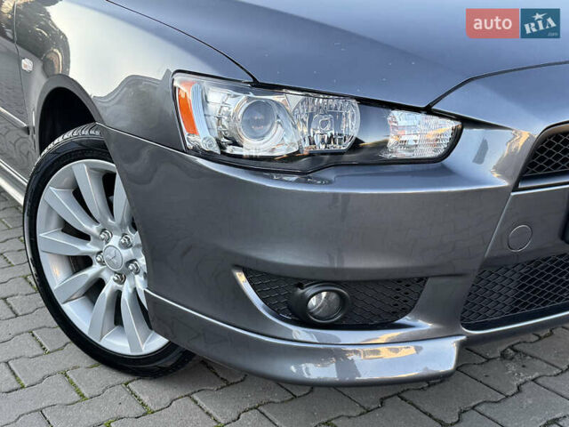 Сірий Міцубісі Lancer, об'ємом двигуна 2 л та пробігом 92 тис. км за 9800 $, фото 41 на Automoto.ua