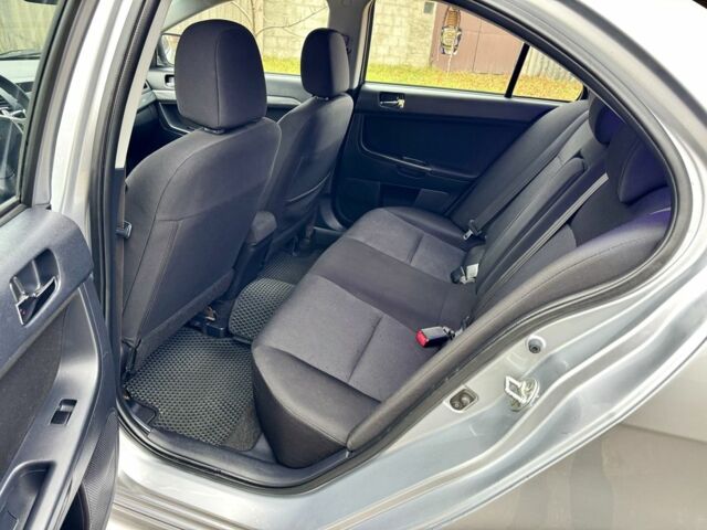 Серый Мицубиси Лансер, объемом двигателя 2 л и пробегом 225 тыс. км за 6890 $, фото 11 на Automoto.ua