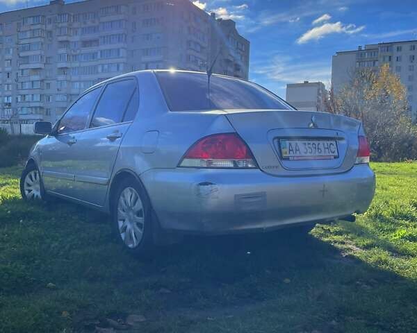 Сірий Міцубісі Lancer, об'ємом двигуна 1.6 л та пробігом 364 тис. км за 4300 $, фото 7 на Automoto.ua