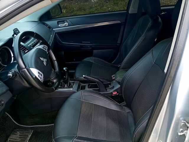 Серый Мицубиси Лансер, объемом двигателя 2 л и пробегом 243 тыс. км за 5500 $, фото 10 на Automoto.ua