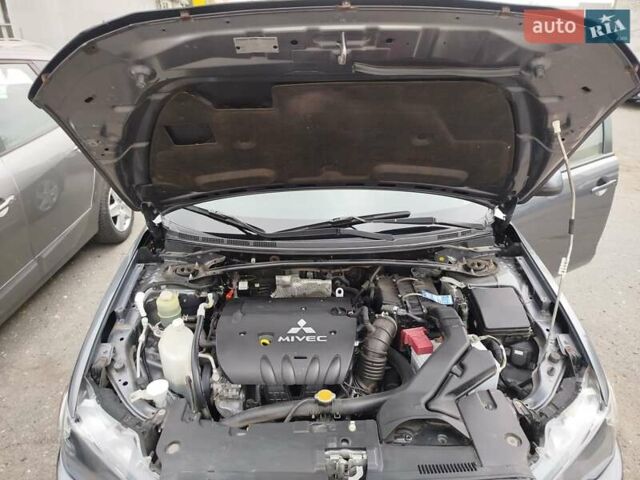 Міцубісі Lancer 2008 у Хмельницькому на Automoto.ua Сірий Міцубісі Lancer, об'ємом двигуна 2 л та пробігом 157 тис. км за 6300 $, фото 33 на Automoto.ua