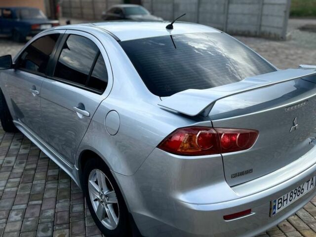 Сірий Міцубісі Lancer, об'ємом двигуна 2 л та пробігом 238 тис. км за 6400 $, фото 9 на Automoto.ua