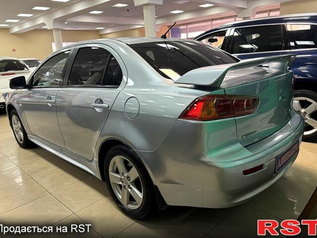 Серый Мицубиси Лансер, объемом двигателя 1.5 л и пробегом 241 тыс. км за 6400 $, фото 1 на Automoto.ua