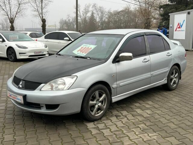 Серый Мицубиси Лансер, объемом двигателя 1.6 л и пробегом 205 тыс. км за 5400 $, фото 2 на Automoto.ua