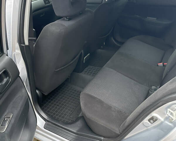 Сірий Міцубісі Lancer, об'ємом двигуна 1.59 л та пробігом 219 тис. км за 4500 $, фото 15 на Automoto.ua