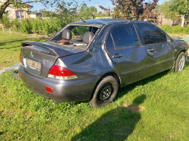 Сірий Міцубісі Lancer, об'ємом двигуна 0 л та пробігом 200 тис. км за 1500 $, фото 2 на Automoto.ua