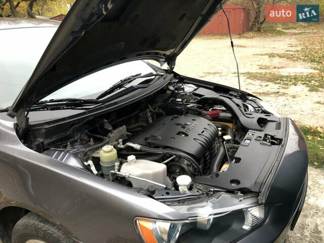 Сірий Міцубісі Lancer, об'ємом двигуна 2 л та пробігом 187 тис. км за 8000 $, фото 17 на Automoto.ua