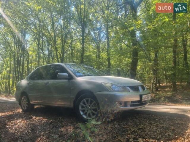 Сірий Міцубісі Lancer, об'ємом двигуна 1.6 л та пробігом 290 тис. км за 3850 $, фото 10 на Automoto.ua