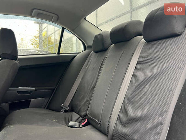 Серый Мицубиси Лансер, объемом двигателя 1.5 л и пробегом 239 тыс. км за 6000 $, фото 18 на Automoto.ua