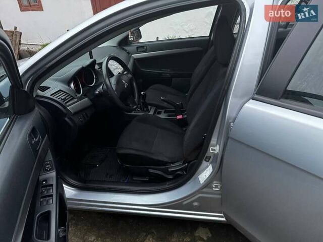 Серый Мицубиси Лансер, объемом двигателя 1.5 л и пробегом 147 тыс. км за 6700 $, фото 15 на Automoto.ua