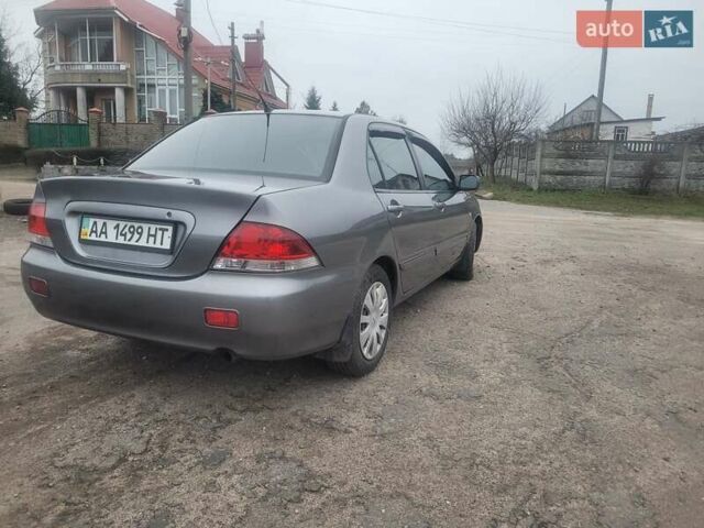 Сірий Міцубісі Lancer, об'ємом двигуна 1.6 л та пробігом 440 тис. км за 4200 $, фото 2 на Automoto.ua