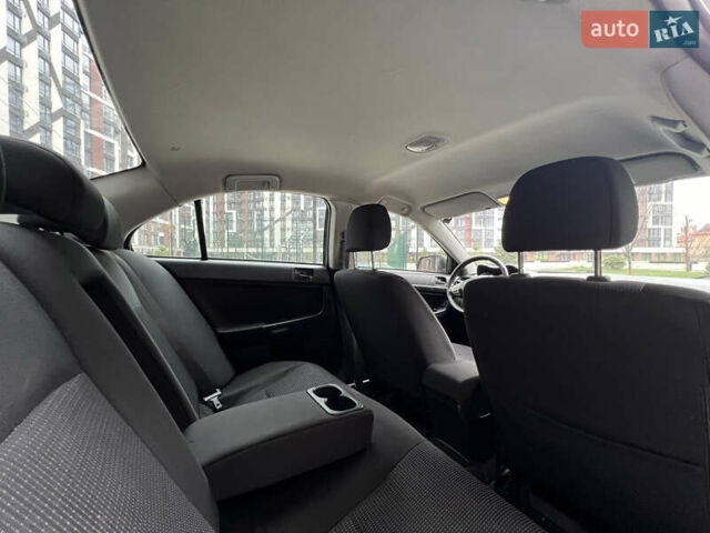 Сірий Міцубісі Lancer, об'ємом двигуна 1.5 л та пробігом 173 тис. км за 4800 $, фото 19 на Automoto.ua