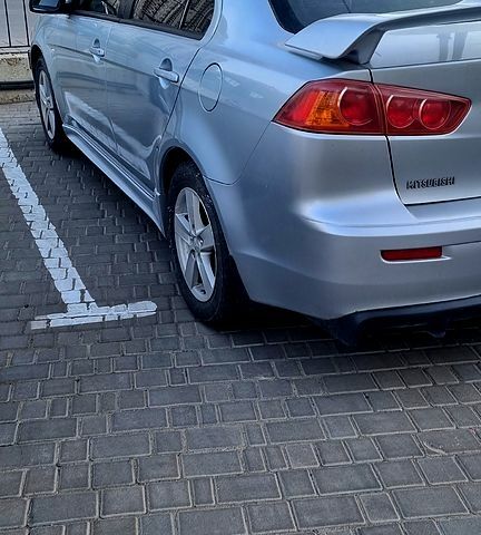 Серый Мицубиси Лансер, объемом двигателя 2 л и пробегом 277 тыс. км за 7300 $, фото 1 на Automoto.ua