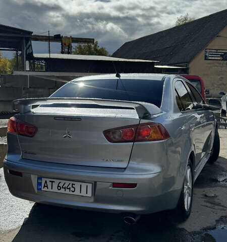 Серый Мицубиси Лансер, объемом двигателя 2 л и пробегом 190 тыс. км за 6900 $, фото 20 на Automoto.ua