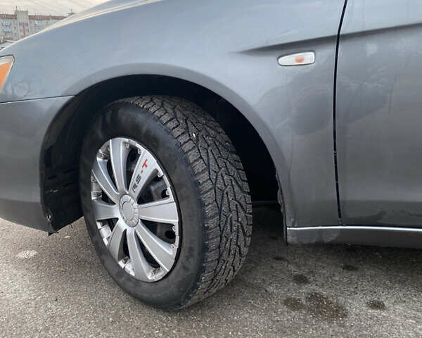 Серый Мицубиси Лансер, объемом двигателя 1.5 л и пробегом 255 тыс. км за 6500 $, фото 10 на Automoto.ua