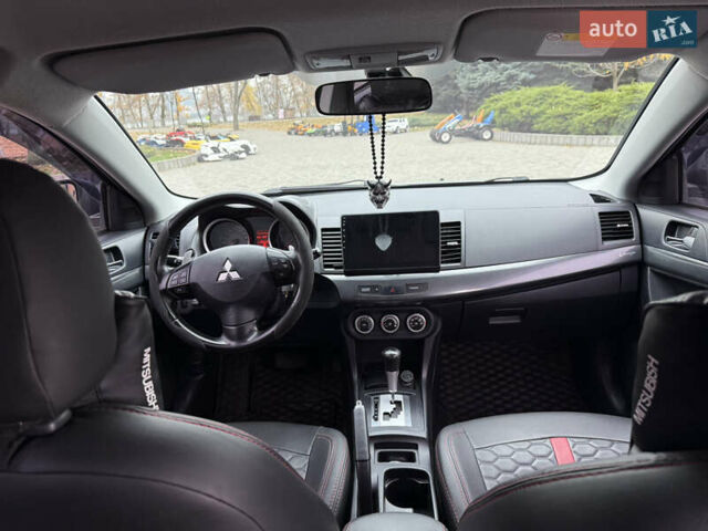 Сірий Міцубісі Lancer, об'ємом двигуна 2 л та пробігом 253 тис. км за 8700 $, фото 37 на Automoto.ua