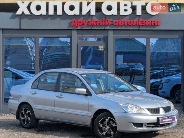 Серый Мицубиси Лансер, объемом двигателя 1.6 л и пробегом 155 тыс. км за 5200 $, фото 10 на Automoto.ua