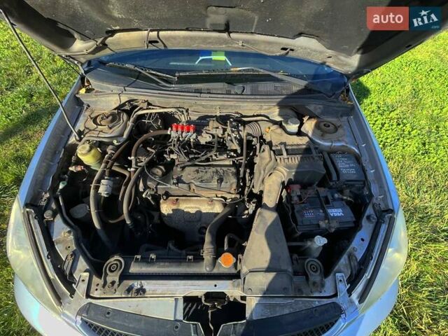 Сірий Міцубісі Lancer, об'ємом двигуна 1.6 л та пробігом 364 тис. км за 4300 $, фото 10 на Automoto.ua