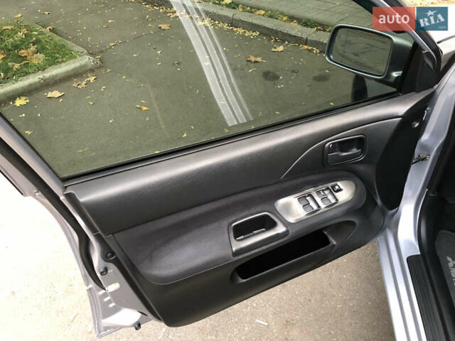 Мицубиси Лансер 2008 в Николаеве на Automoto.ua Серый Мицубиси Лансер, объемом двигателя 1.58 л и пробегом 132 тыс. км за 5900 $, фото 18 на Automoto.ua