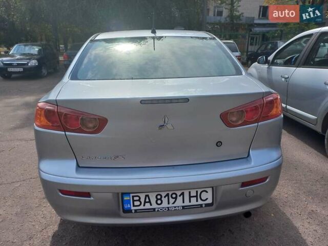 Серый Мицубиси Лансер, объемом двигателя 2 л и пробегом 103 тыс. км за 7700 $, фото 7 на Automoto.ua
