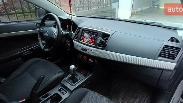 Серый Мицубиси Лансер, объемом двигателя 1.5 л и пробегом 230 тыс. км за 6300 $, фото 14 на Automoto.ua