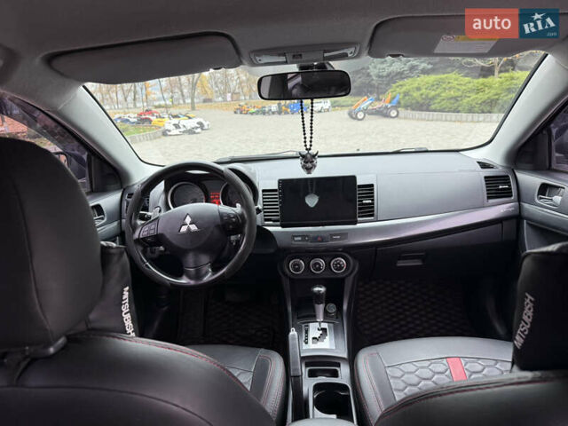 Сірий Міцубісі Lancer, об'ємом двигуна 2 л та пробігом 253 тис. км за 8700 $, фото 38 на Automoto.ua