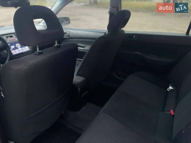 Сірий Міцубісі Lancer, об'ємом двигуна 1.6 л та пробігом 254 тис. км за 3800 $, фото 21 на Automoto.ua