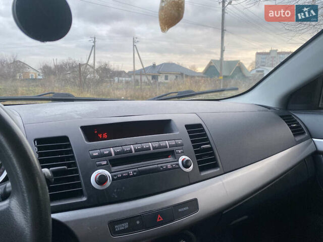 Серый Мицубиси Лансер, объемом двигателя 1.5 л и пробегом 255 тыс. км за 6500 $, фото 21 на Automoto.ua