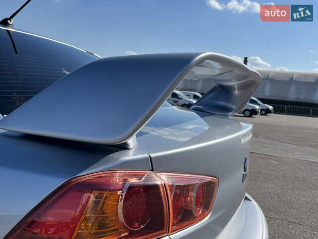 Сірий Міцубісі Lancer, об'ємом двигуна 2 л та пробігом 237 тис. км за 7200 $, фото 25 на Automoto.ua
