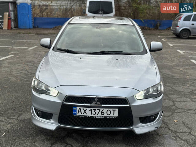 Сірий Міцубісі Lancer, об'ємом двигуна 2 л та пробігом 104 тис. км за 5999 $, фото 2 на Automoto.ua
