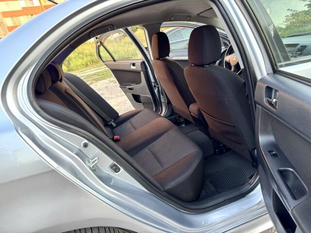 Сірий Міцубісі Lancer, об'ємом двигуна 2 л та пробігом 223 тис. км за 6890 $, фото 15 на Automoto.ua