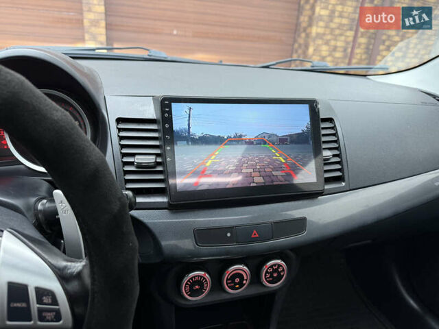 Сірий Міцубісі Lancer, об'ємом двигуна 2 л та пробігом 92 тис. км за 8200 $, фото 59 на Automoto.ua