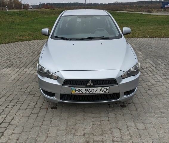 Серый Мицубиси Лансер, объемом двигателя 1.5 л и пробегом 147 тыс. км за 6700 $, фото 1 на Automoto.ua