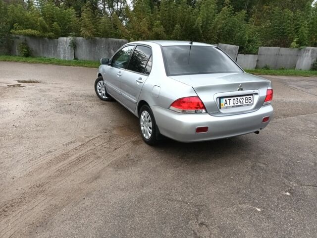 Сірий Міцубісі Lancer, об'ємом двигуна 1.6 л та пробігом 224 тис. км за 3100 $, фото 5 на Automoto.ua