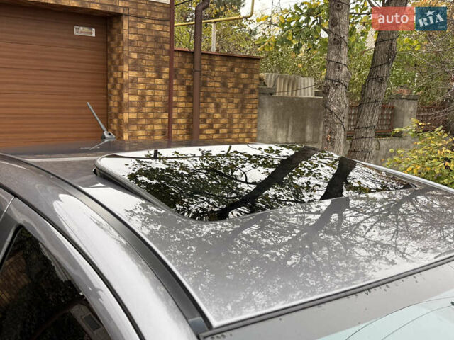 Сірий Міцубісі Lancer, об'ємом двигуна 2 л та пробігом 92 тис. км за 8200 $, фото 4 на Automoto.ua