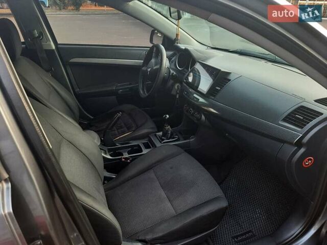 Сірий Міцубісі Lancer, об'ємом двигуна 1.5 л та пробігом 202 тис. км за 5899 $, фото 14 на Automoto.ua