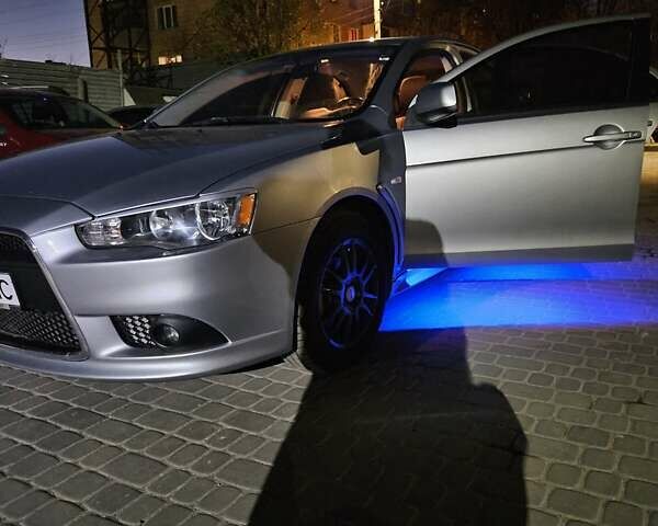 Сірий Міцубісі Lancer, об'ємом двигуна 2 л та пробігом 125 тис. км за 7600 $, фото 10 на Automoto.ua